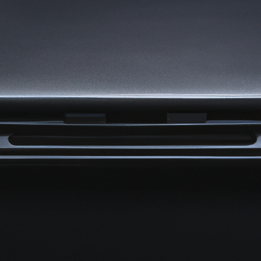 A close-up of the space black aluminum chassis of the macbook pro